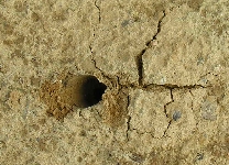 Loch im Sand